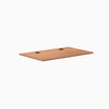 Prime Oak laminate desktop, 47.2" x 29.5", with two black grommets.