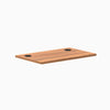 Prime Oak 32x20 inch melamine laminate desktop with two black grommets.