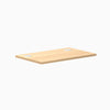 Desky Mini Laminate Desktop in Sublime Teak, 32x20 inches, with two silver grommets.