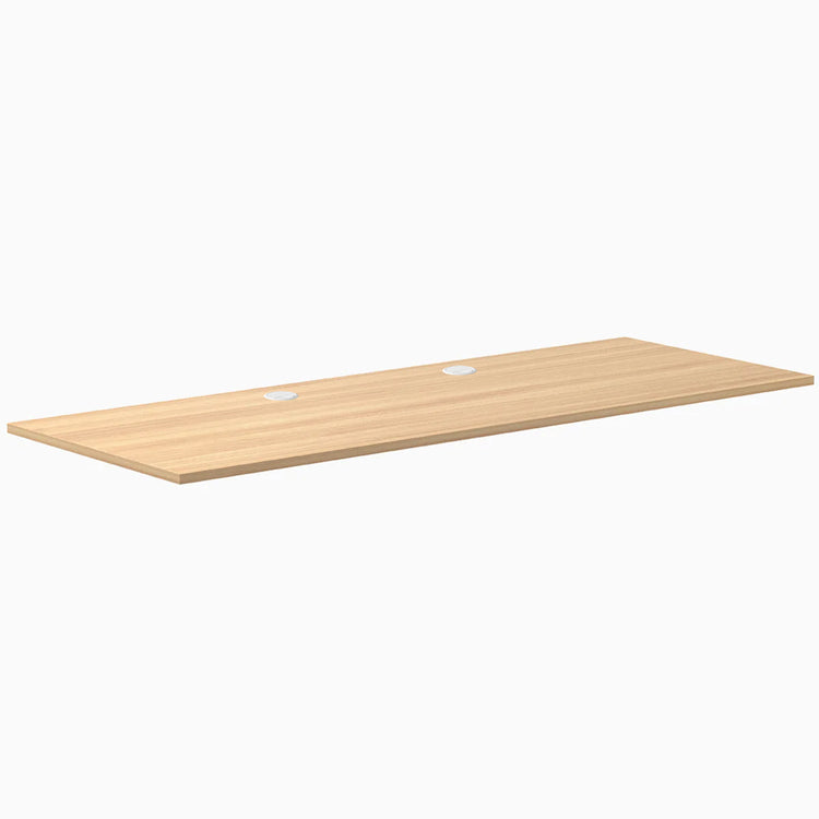 Desky Sublime Teak laminate desktop, 78.7 x 29.5 inches, with two white grommets.