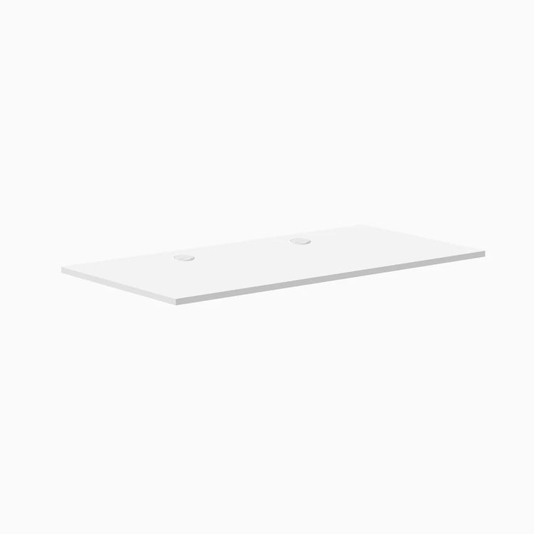 White Desky laminate desktop, 59.1" x 29.5", with two grommets for cable management.