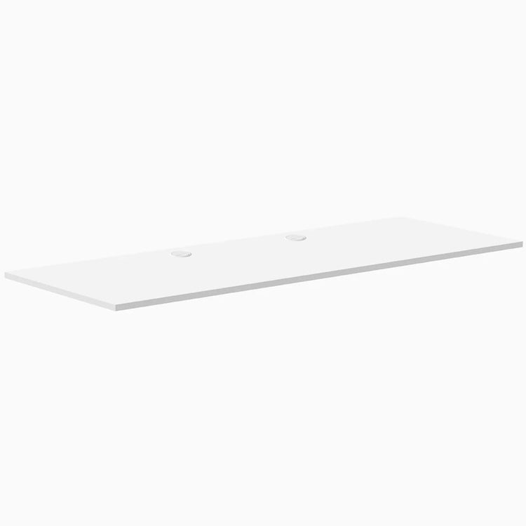 White laminate desktop, 78.7 x 29.5 inches, with two grommets for cable management.