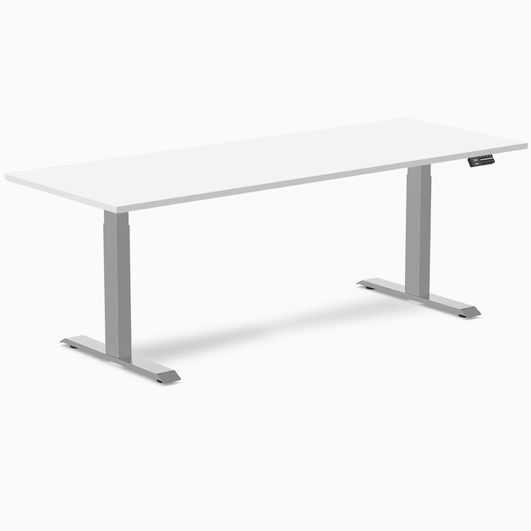 White laminate Desky Dual sit-stand desk with silver adjustable legs and control panel.