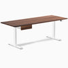 Walnut hardwood standing desk with white legs and matching under-desk drawer.