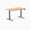Desky Dual 48x30 inch White Oak hardwood sit-stand desk with Space Gray legs and control panel.