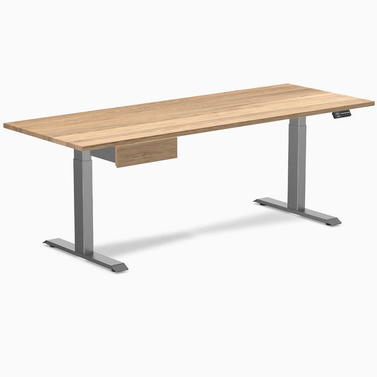 White Oak hardwood standing desk, 80x30, with Space Gray legs and an under-desk drawer.