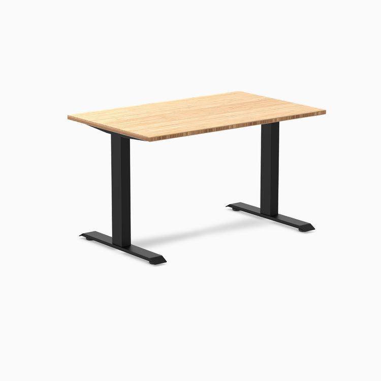 Desky Zero fixed height office desk with 48x30 inch bamboo top and matte black steel frame.