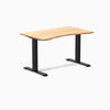 Desky Zero Ergo Edge Office Desk with a bamboo top and matte black frame.