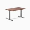 Desky Zero Hardwood Office Desk with a Walnut top and Space Gray steel frame.