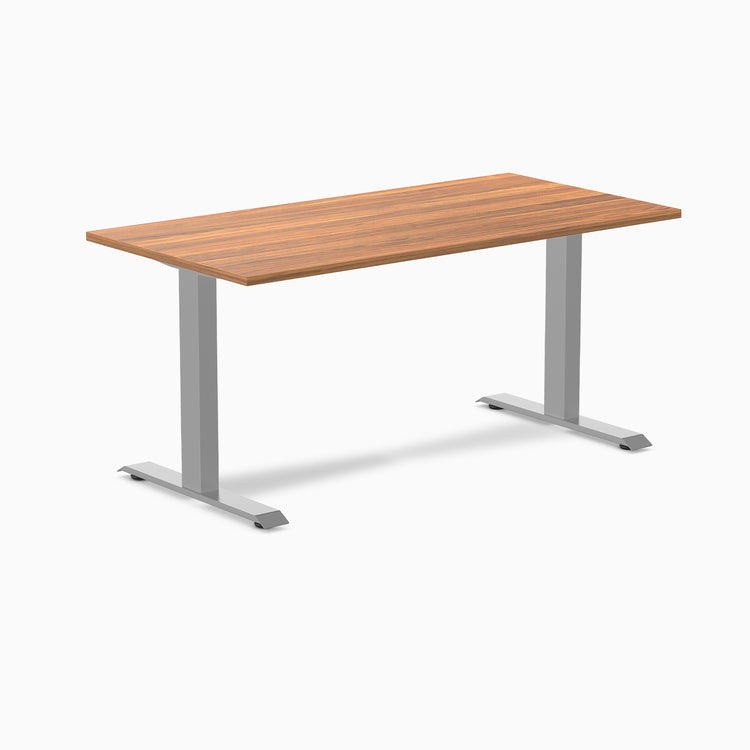 Desky Zero fixed height office desk with a natural wood laminate top and silver steel frame.