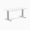 Desky Zero fixed-height office desk with a white laminate top and sleek silver steel frame.
