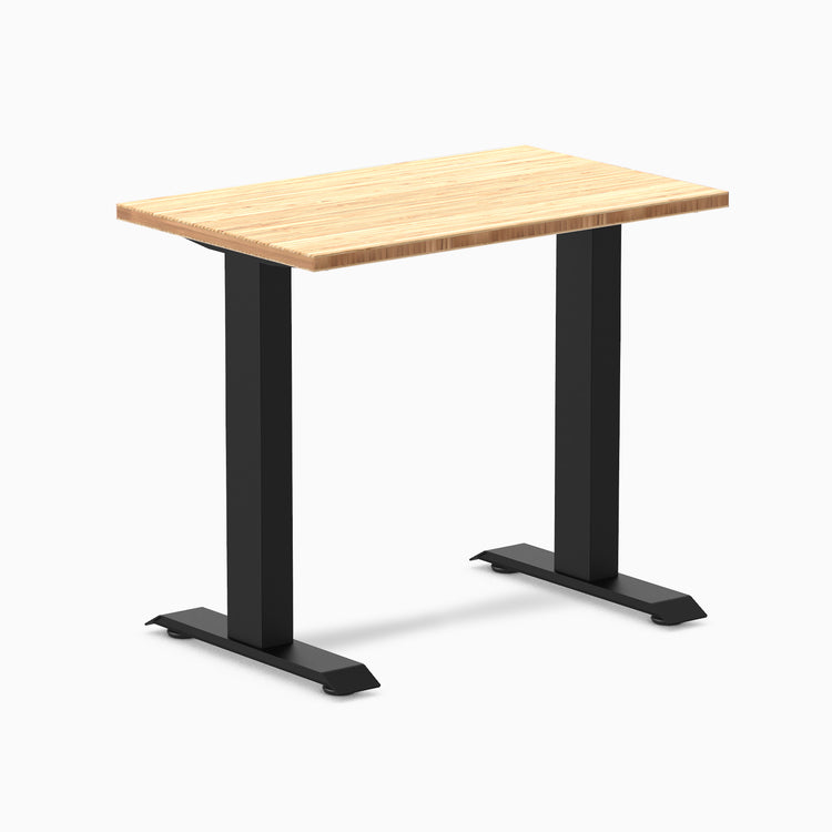 Desky Zero Mini 32x20 inch bamboo desk with matte black fixed-height frame.