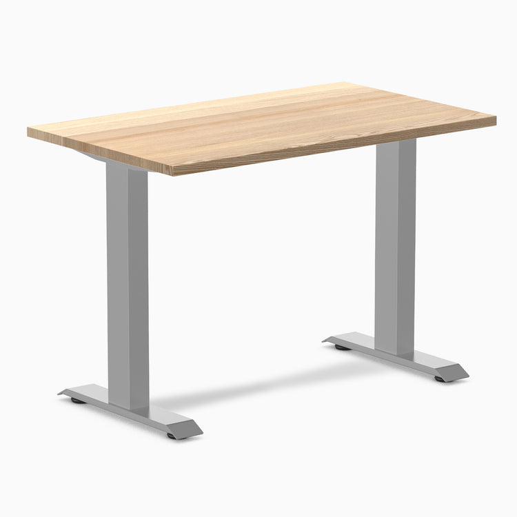 Desky Zero Mini hardwood desk with a light White Ash top and gray steel frame.