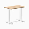 Desky Zero Mini hardwood desk with a light White Ash top and white steel frame.