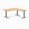 Desky Zero L-Shape Office Desk with White Oak hardwood top and Space Gray steel frame.