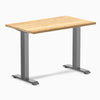 Desky Zero Mini hardwood desk with White Oak top and Space Gray steel frame.