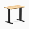 Desky Zero Mini Hardwood Desk with White Oak top and matte black steel frame.