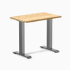Desky Zero Mini hardwood desk with a White Oak top and Space Gray steel frame.
