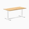 Desky Zero ergonomic office desk with a White Oak hardwood top and white steel frame.