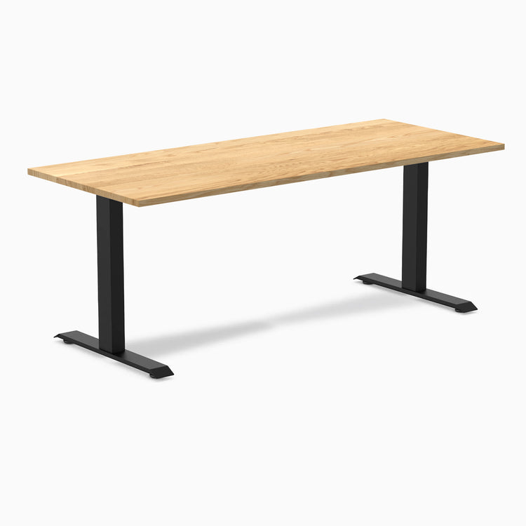 Desky Zero fixed-height office desk with a White Oak hardwood top and matte black steel frame.