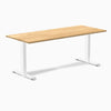 Desky Zero office desk with a 72x30 inch White Oak hardwood top and a white steel frame.